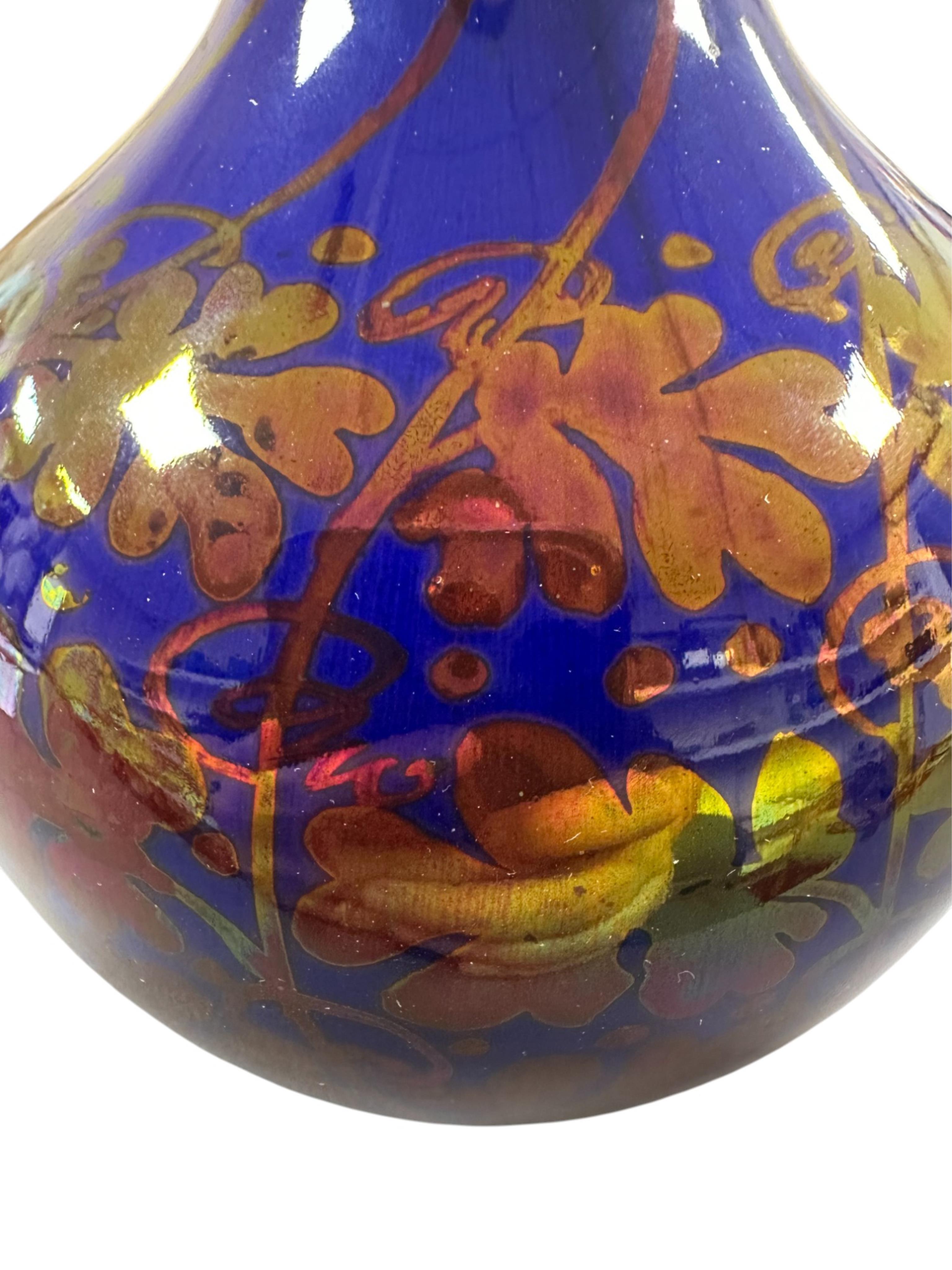 Gordon M. Forsyth (1879–1952) for Pilkingtons Royal Lancastrian: A copper lustre bottle vase